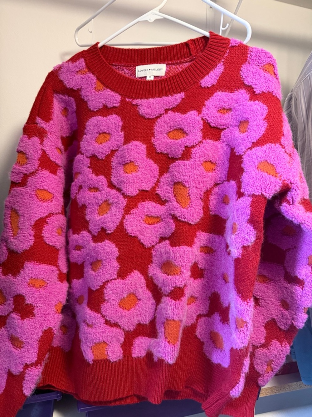 Lovely Melody Red Crewneck Sweater with Pink Floral Motif and Orange Centers